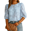 Women's elegant floral print fashion top front view in black